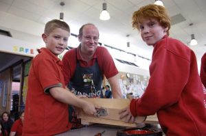 Staff steer billycart students