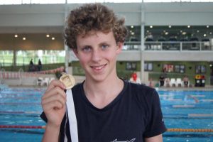 Bass boy swims himself to glory