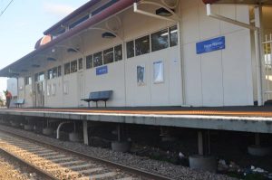 Station parking clamp-down