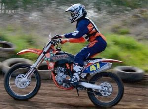 On trail of dirt bike