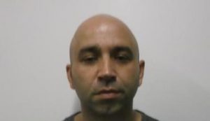 Manhunt after woman stabbed