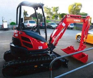 Excavator taken in building site break-in