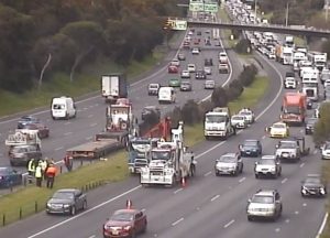 Traffic squeeze on Monash after truck load hits overpass