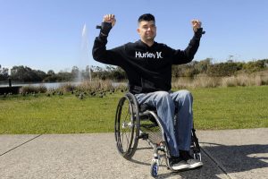 Wheelchair-bound man to push through 42km marathon