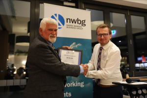 Business group rolls in new president