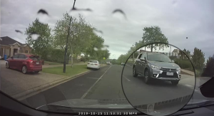 Milk carton flies into car