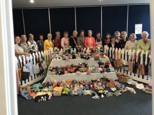 Santa’s helpers craft toys for underprivileged