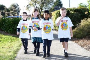 Local students put on their walking shoes