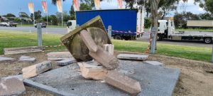 Two injured as car destroys war shrine