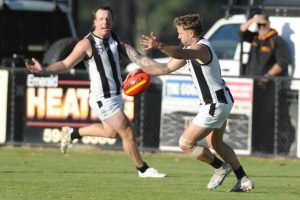 Magpies spoil Bombers party as Officer opens account