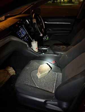 Youths throw bricks from overpass, damaging cars and injuring a driver